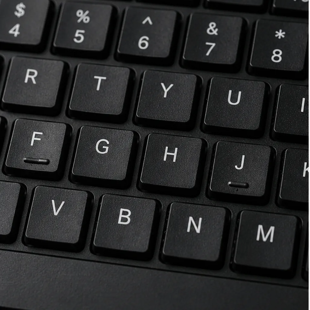 Illustration of keyboards have little bumps on f and j for the question "Why do keyboards have little bumps on F and J?"