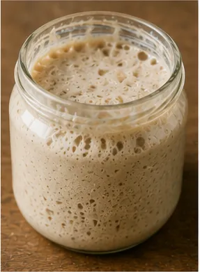 Illustration of sourdough keep bubbling without a packet of yeast for the question "How does sourdough keep bubbling without a packet of yeast?"