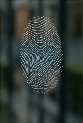 Illustration of fingerprints show up on glass for the question "Why do fingerprints show up on glass?"